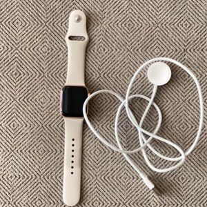 Apple Watch SE; 2023 Gen; with charger and cream band; BROKEN CROWN